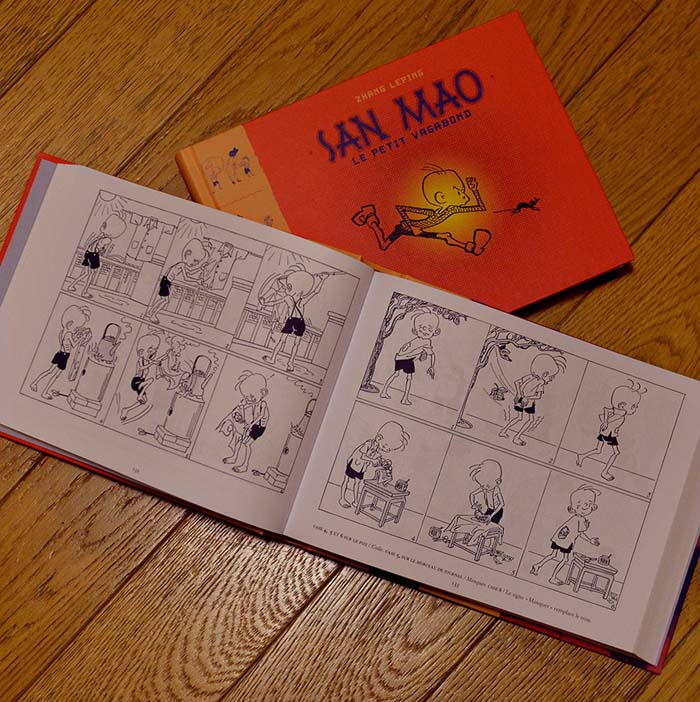Deux livres en français de Sanmao, le petit vagabond, la BD chinoise créée par Chen Leping. (Photo : Xinhua/Chen Xiaowei)