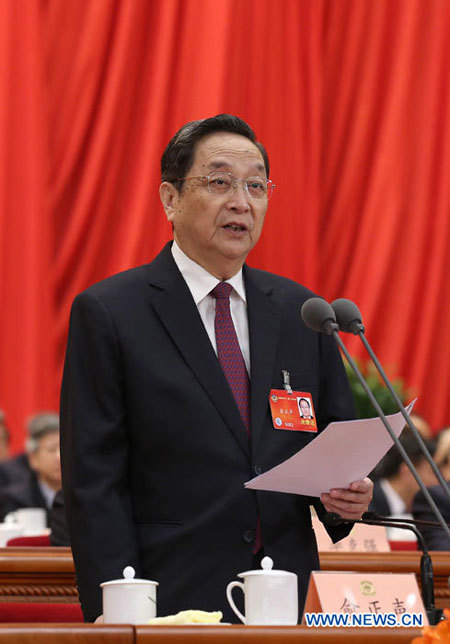 Yu Zhengsheng, président du Comité national de la CCPPC, préside la conférence de clôture tenue au Grand Palais du Peuple à Beijing