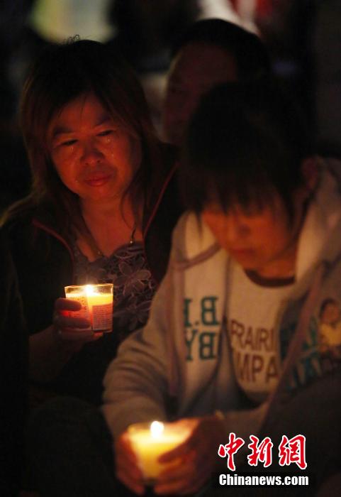 Beijing : les familles des passagers du vol MH370 continuent de prier (11)