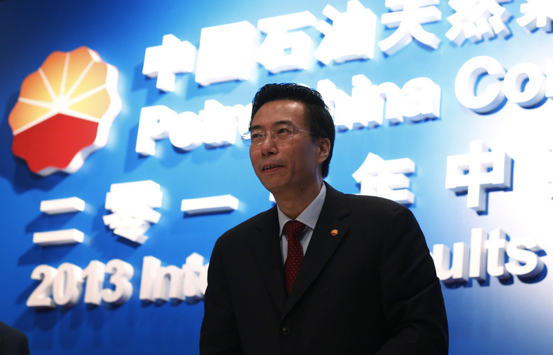 Le président du groupe Wang Dongjin assiste à l'annonce des résultats provisoires de la société à Hong Kong, le 22 août 2013.